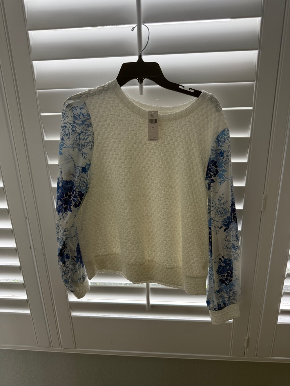 Anthropologie Cream Sweater with Blue Floral Sleeves